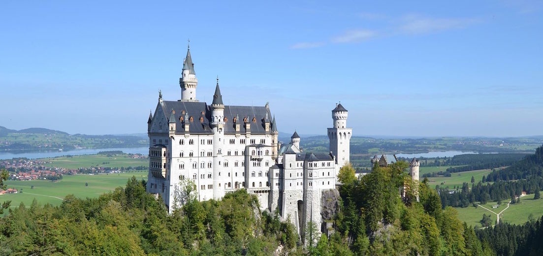 View of Neuschwanstein castle, Germany. Germany’s most famous and the world's most beautiful castle. #travel #Neuschwanstein www.road-ventures.com
