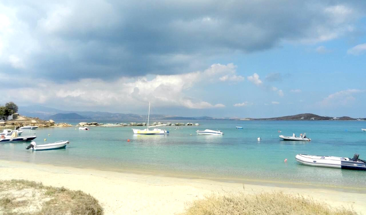 Naxos, Greece. A picturesque beach with soft sand and crystal water. #travel #Naxos www.road-ventures.com