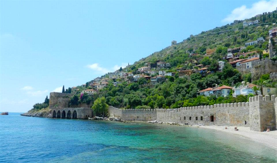The old fort surrounded by Turkish houses in the city of Alanya, Turkey. #travel #Alanya www.roadventures.com